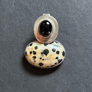 Elegant Black and Cream Stone Pendant